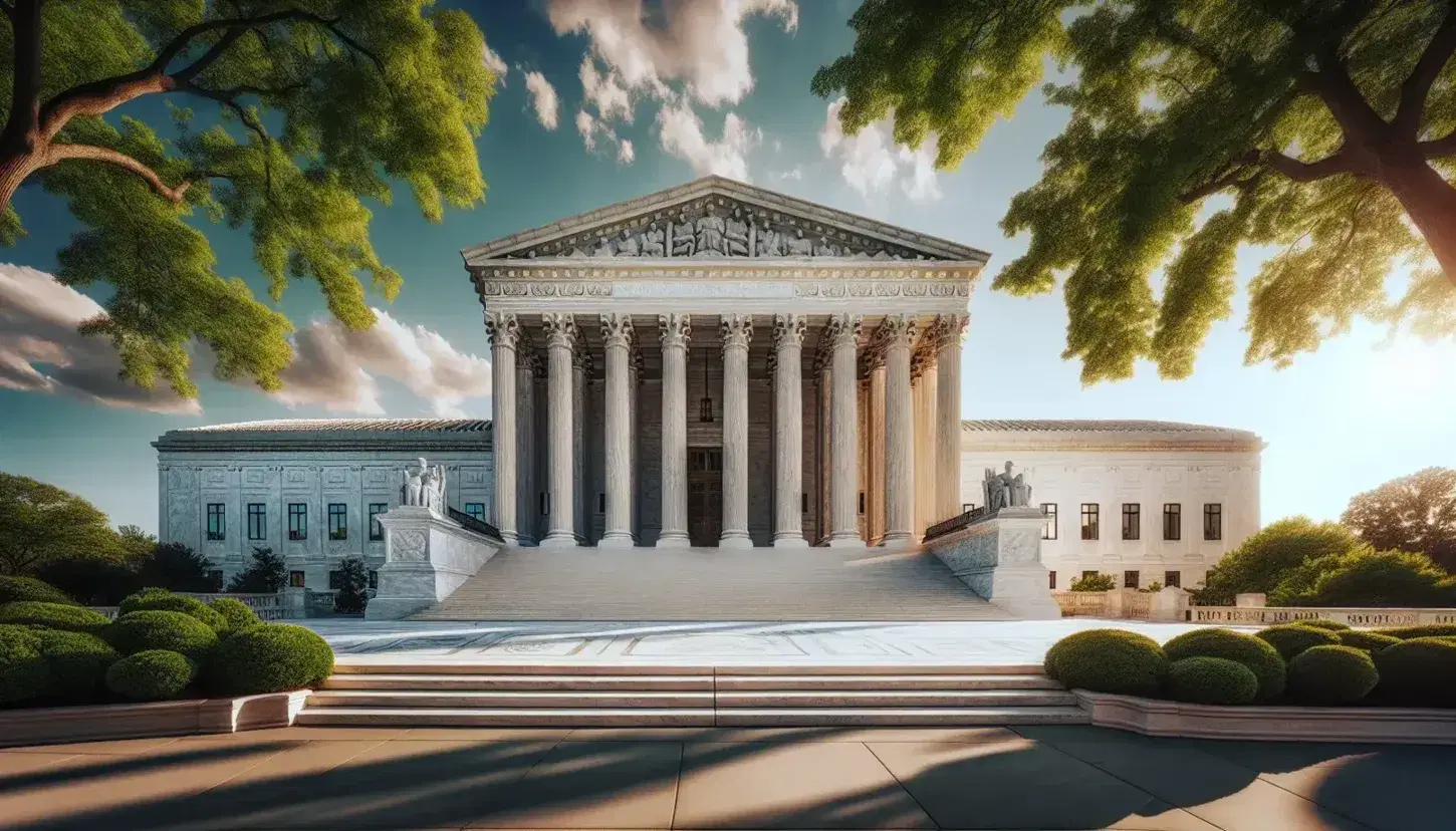 Supreme Court building in Washington D.C. with Corinthian columns and marble facade, flanked by lush trees under a clear blue sky.