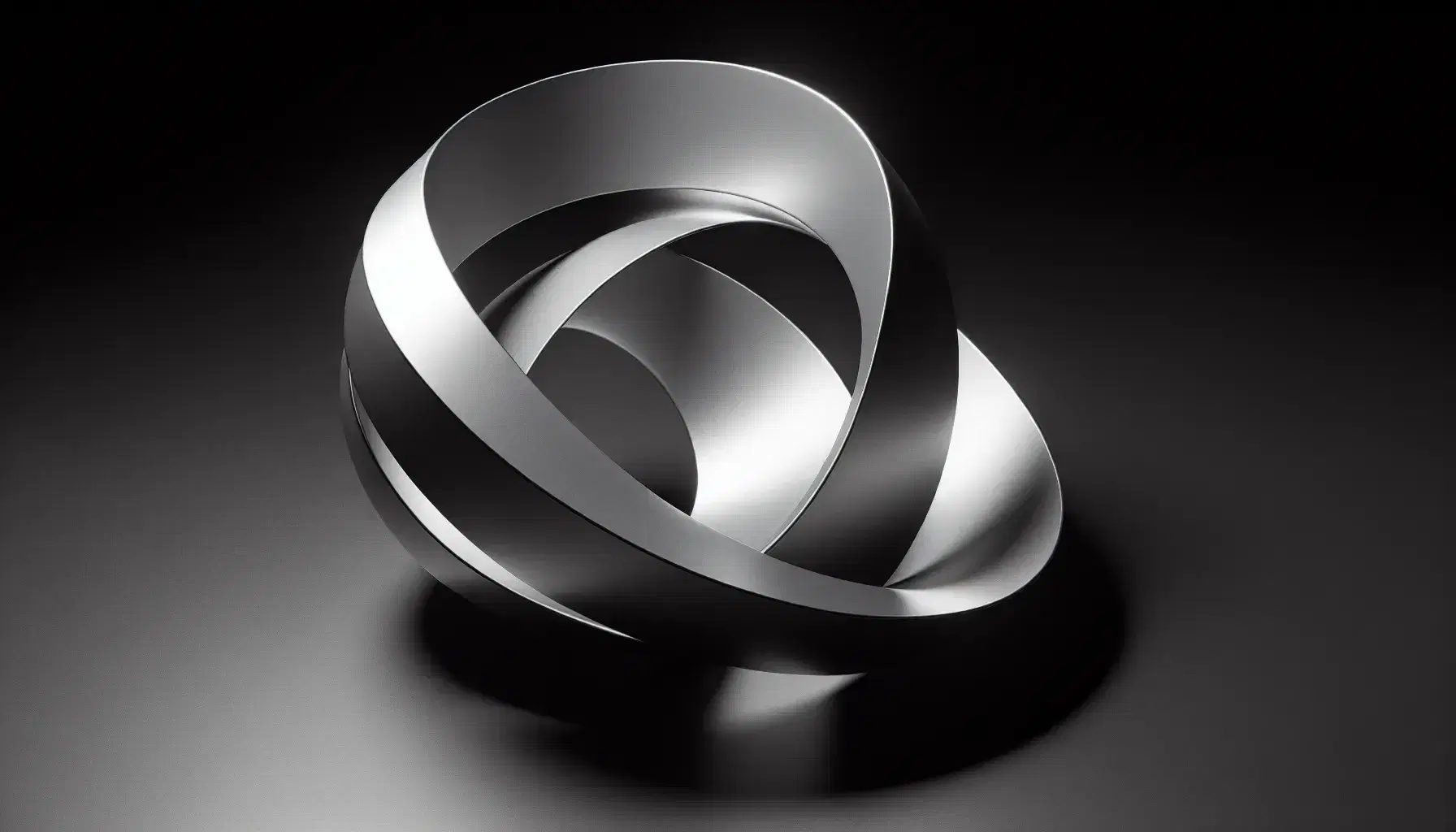 Three-dimensional Möbius strip model with a metallic silver finish on a matte black background, highlighting its unique, twisted, one-sided surface.